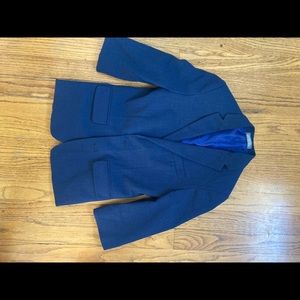 Boy’s light navy suit jacket.